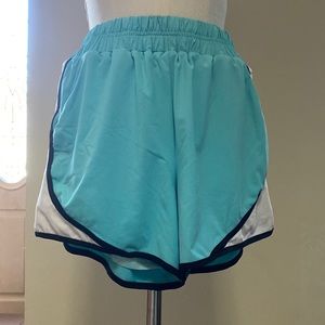❤️🤍💙 Small turquoise workout shorts with built in briefs